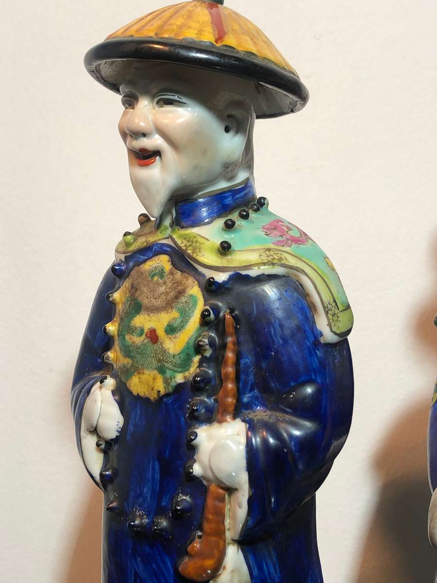 A Trio of Chinese Emperor Porcelain Statues
