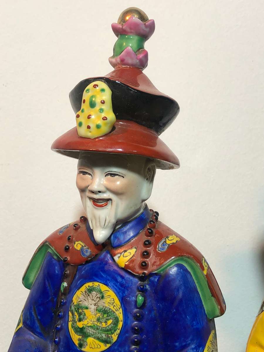 A Trio of Chinese Emperor Porcelain Statues