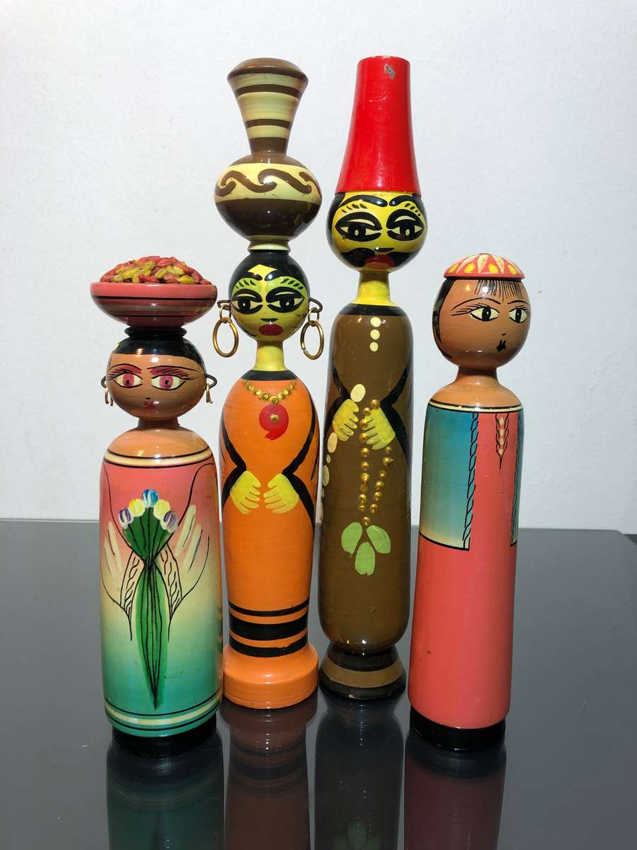 A Set of Mid Century Egyptian Wooden Folk Dolls