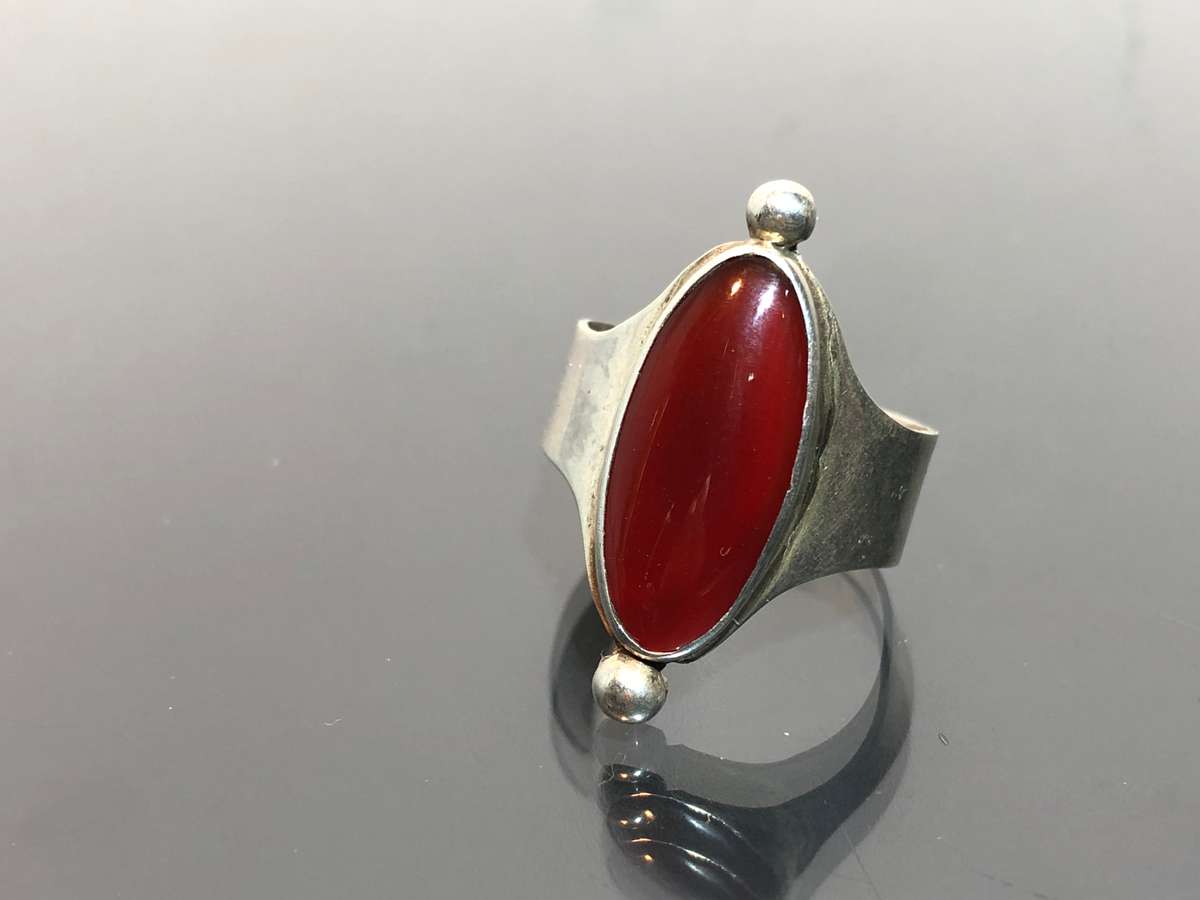 A Silver Ring set with a Red Carnelian Stone