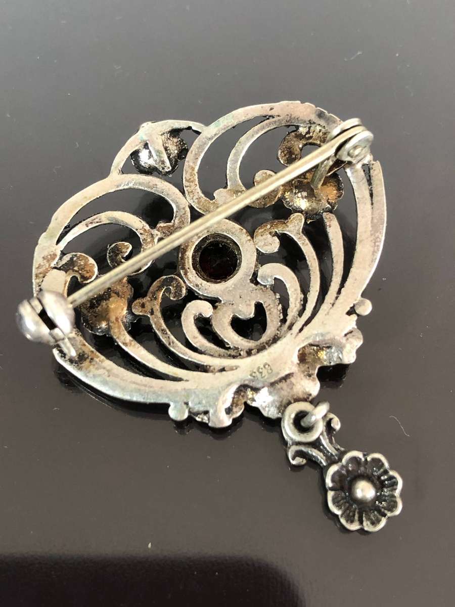 A Victorian Period Silver Pin Brooch with Possible Garnet