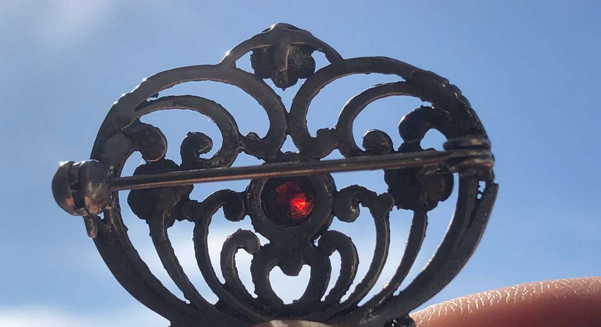 A Victorian Period Silver Pin Brooch with Possible Garnet