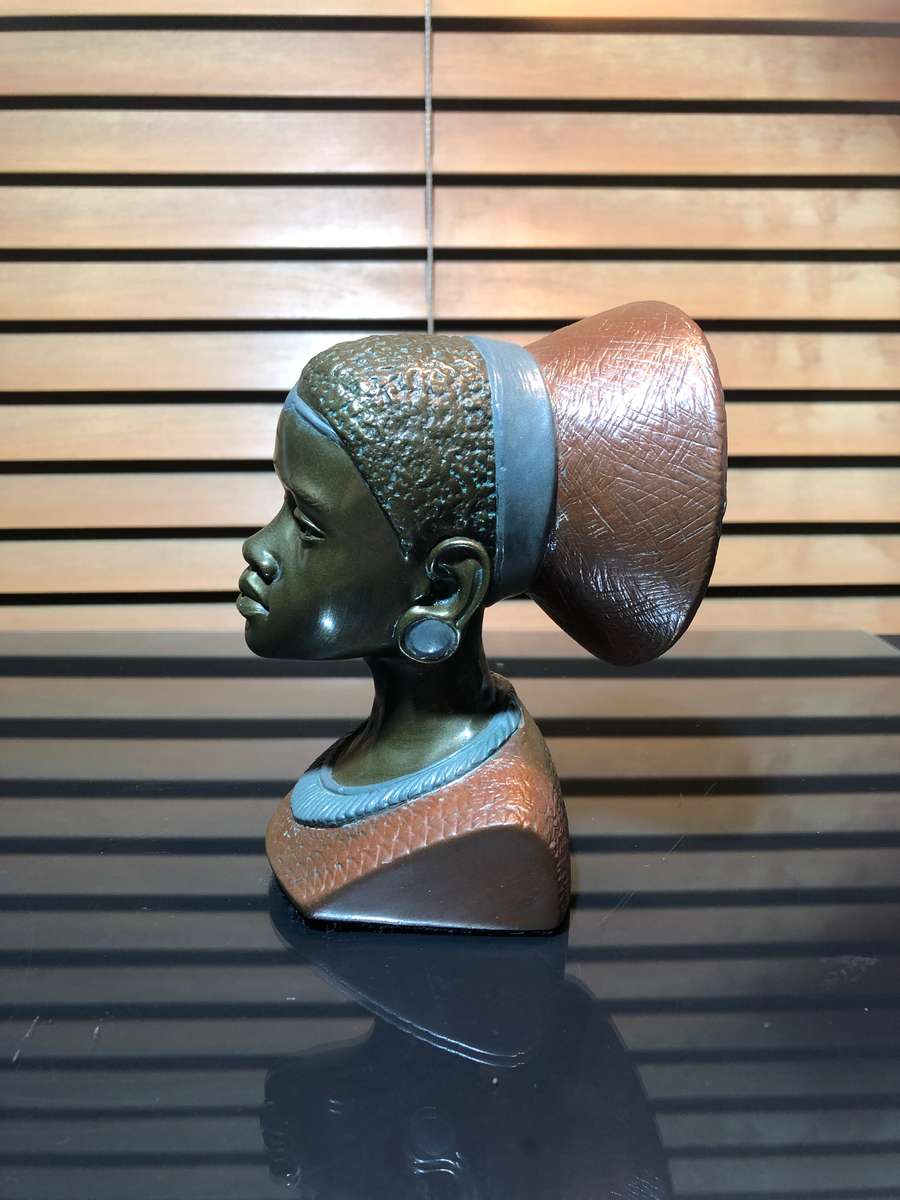 A Bronze Clad Sculpture of a Shona Woman by Casper Darare (1952-2001)