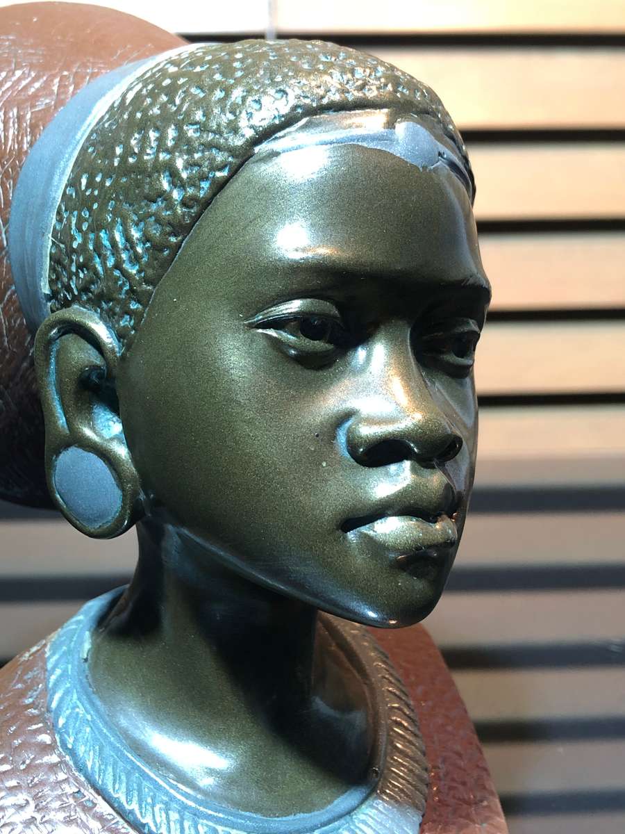 A Bronze Clad Sculpture of a Shona Woman by Casper Darare (1952-2001)