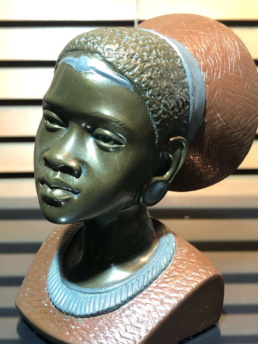 A Bronze Clad Sculpture of a Shona Woman by Casper Darare (1952-2001)