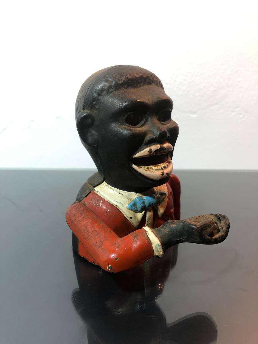 Antique Cast Iron Jolly Americana Money Bank