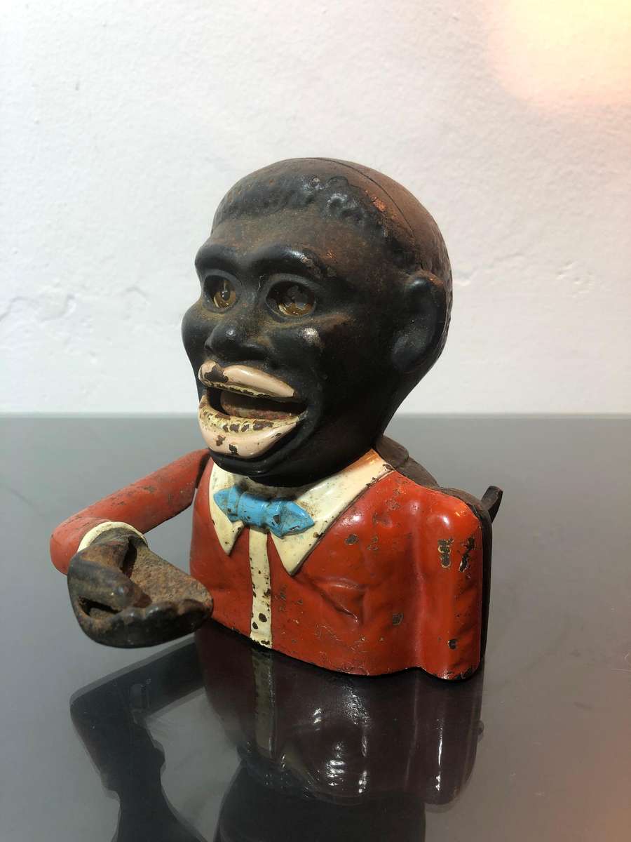 Antique Cast Iron Jolly Americana Money Bank