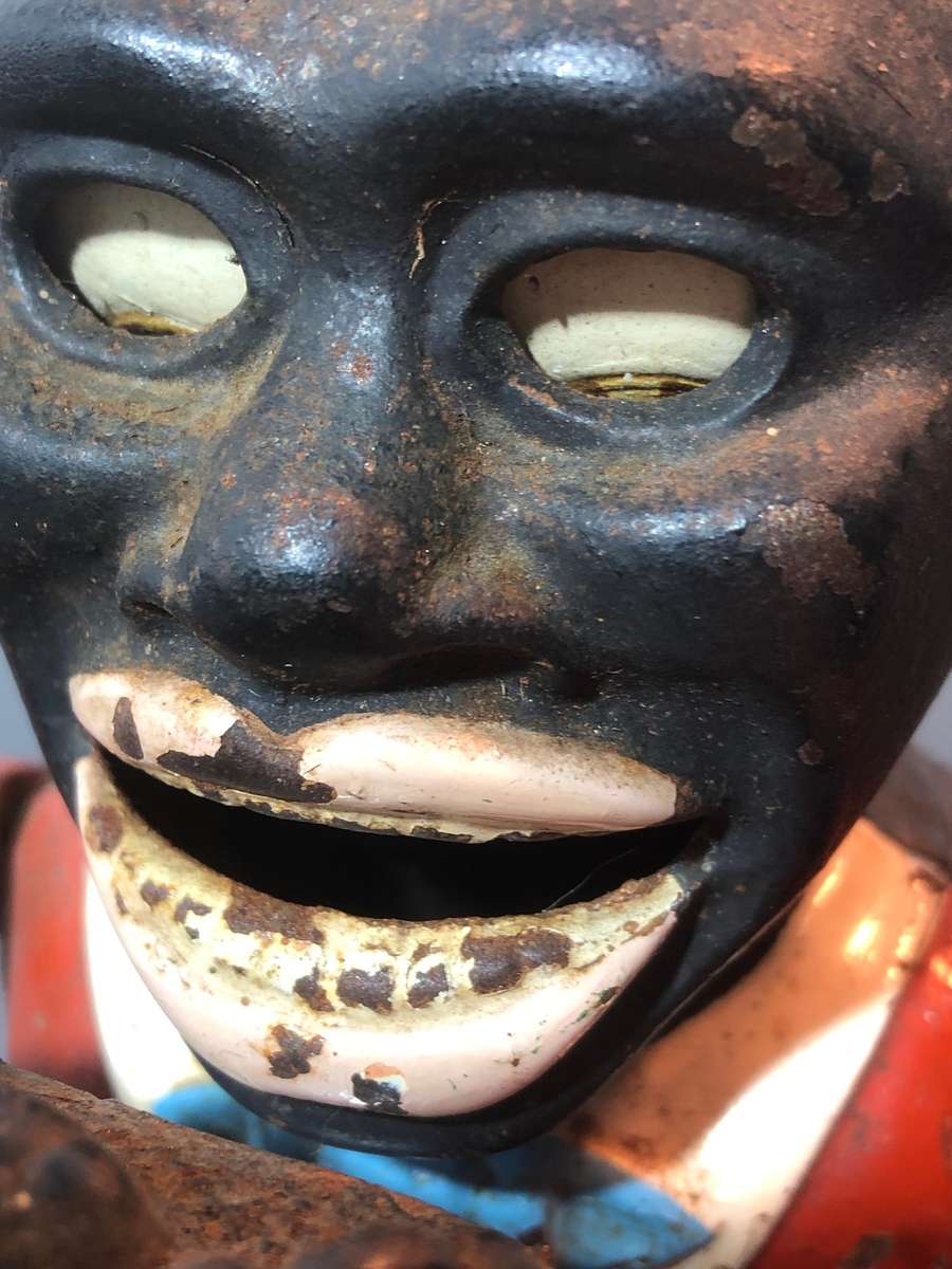 Antique Cast Iron Jolly Americana Money Bank