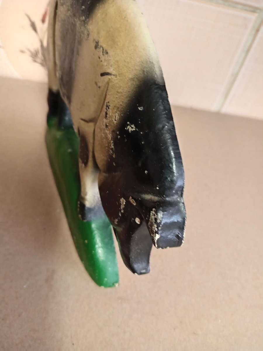 VINTAGE CAST IRON PIG SHAPED DOOR STOPPER