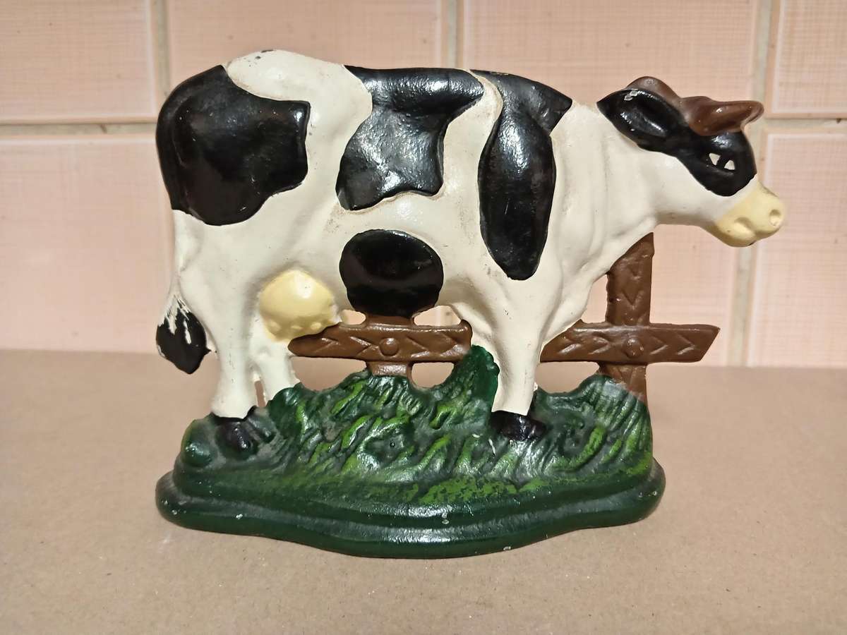 VINTAGE CAST IRON COW SHAPED DOOR STOPPER