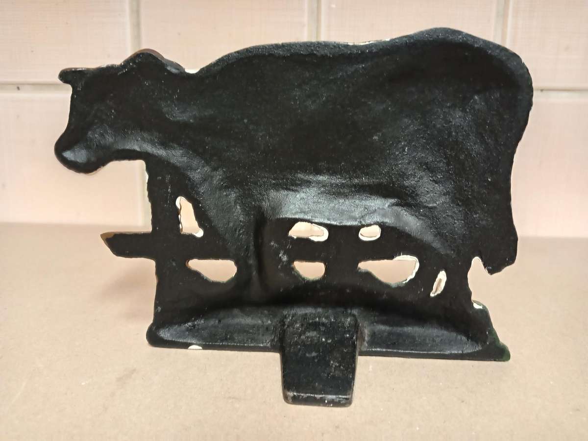 VINTAGE CAST IRON COW SHAPED DOOR STOPPER