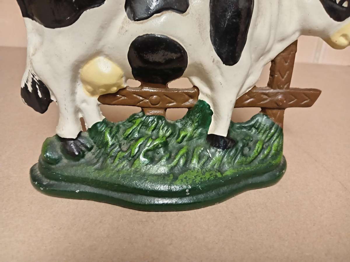 VINTAGE CAST IRON COW SHAPED DOOR STOPPER