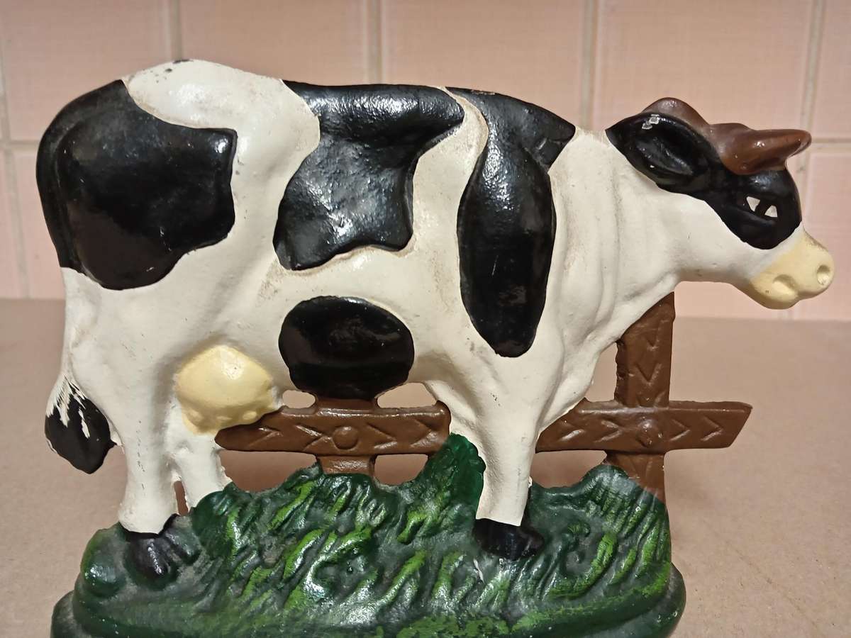 VINTAGE CAST IRON COW SHAPED DOOR STOPPER