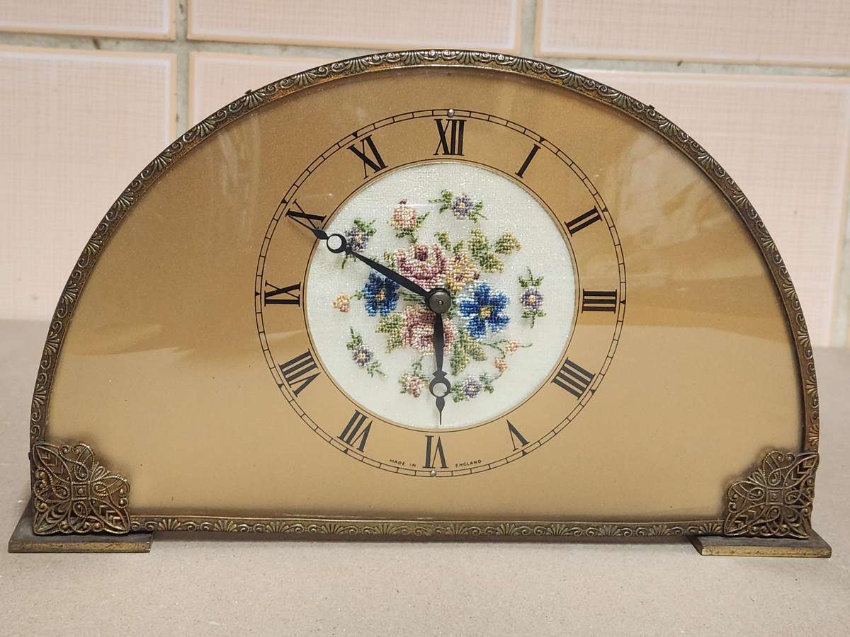 1930'S PETIT POINT FLORAL DRESSER/MANTEL CLOCK IN A WORKING CONDITION