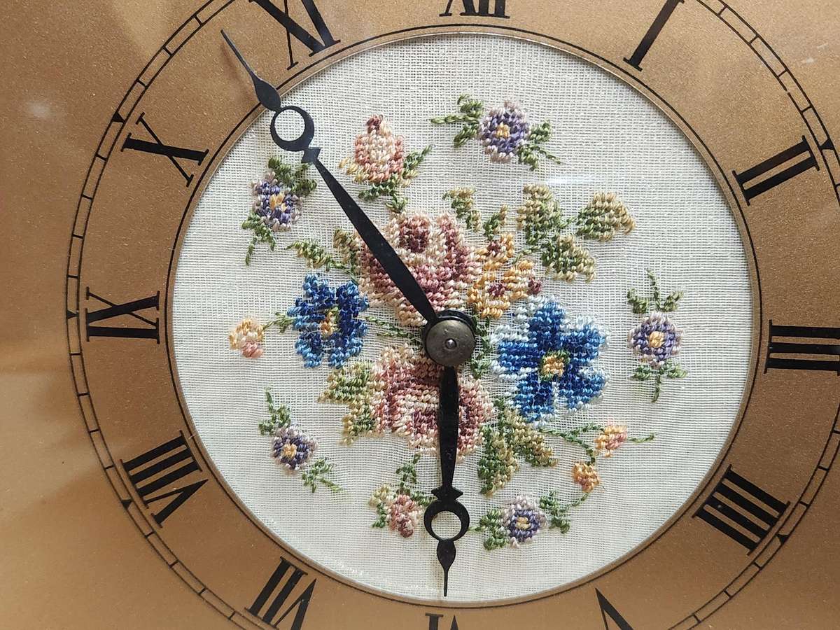 1930'S PETIT POINT FLORAL DRESSER/MANTEL CLOCK IN A WORKING CONDITION