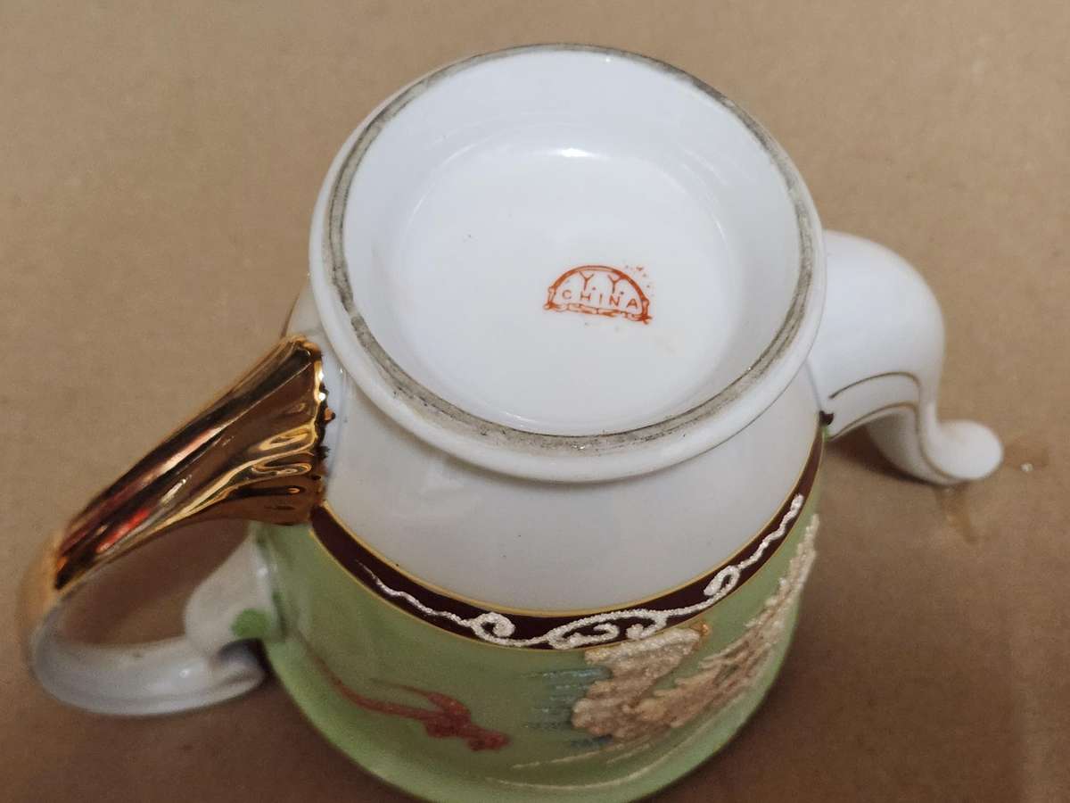 VINTAGE CHINESE DRAGON MOTIF TEA POT AND PLATE, MARKED AT THE BASE