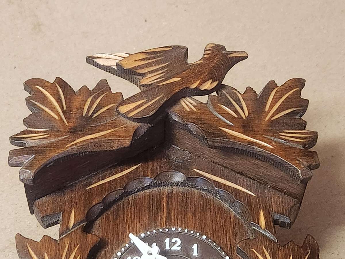 J ENGSTLER MINIATURE CUCKOO CLOCK IN WORKING CONDITION