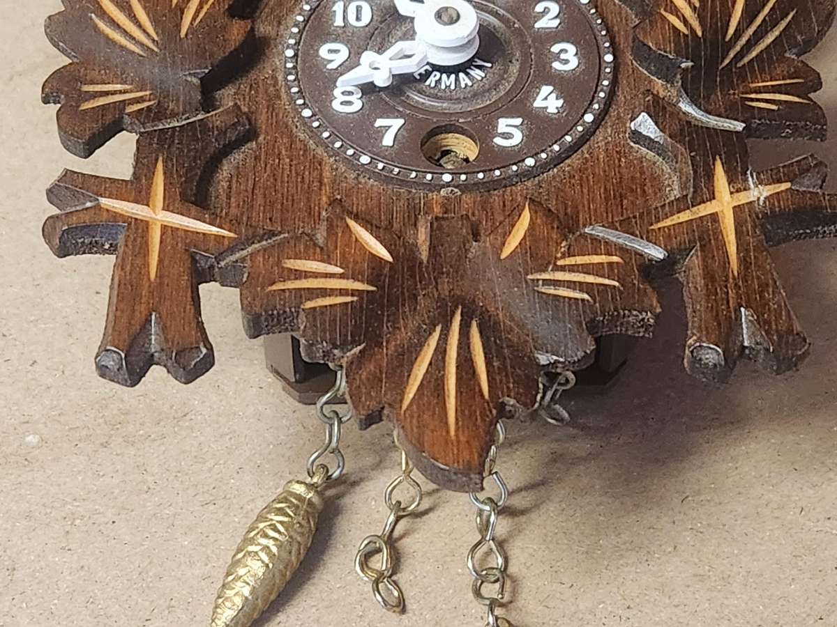 J ENGSTLER MINIATURE CUCKOO CLOCK IN WORKING CONDITION