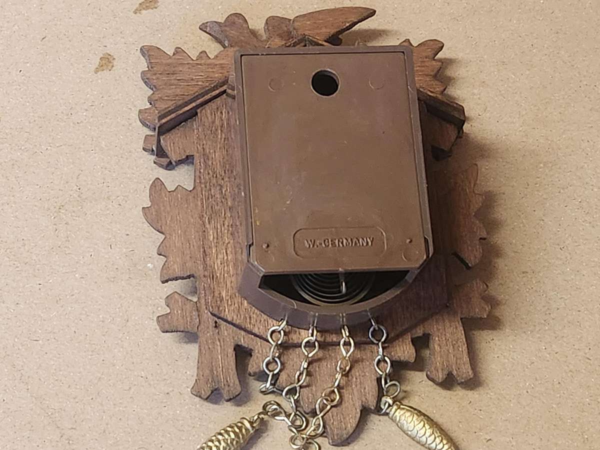 J ENGSTLER MINIATURE CUCKOO CLOCK IN WORKING CONDITION
