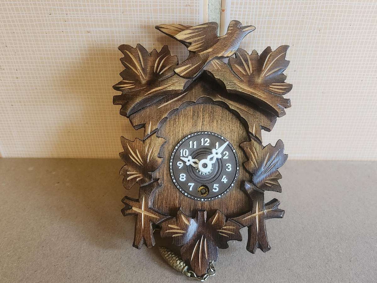 J ENGSTLER MINIATURE CUCKOO CLOCK IN WORKING CONDITION