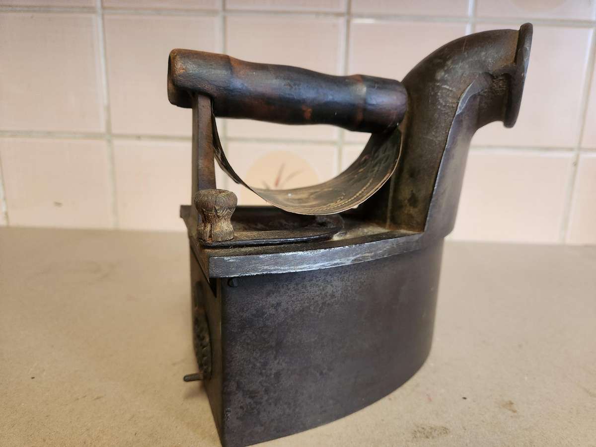 Antique cast iron charcoal sad iron with funnel