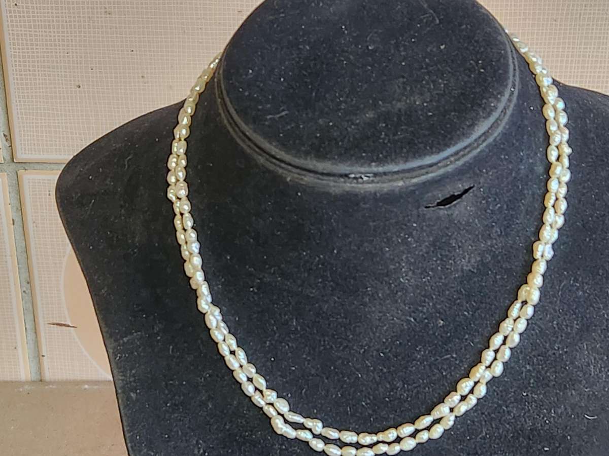 TWIN STRAND CULTURED PEARLS WITH A SILVER CLASP