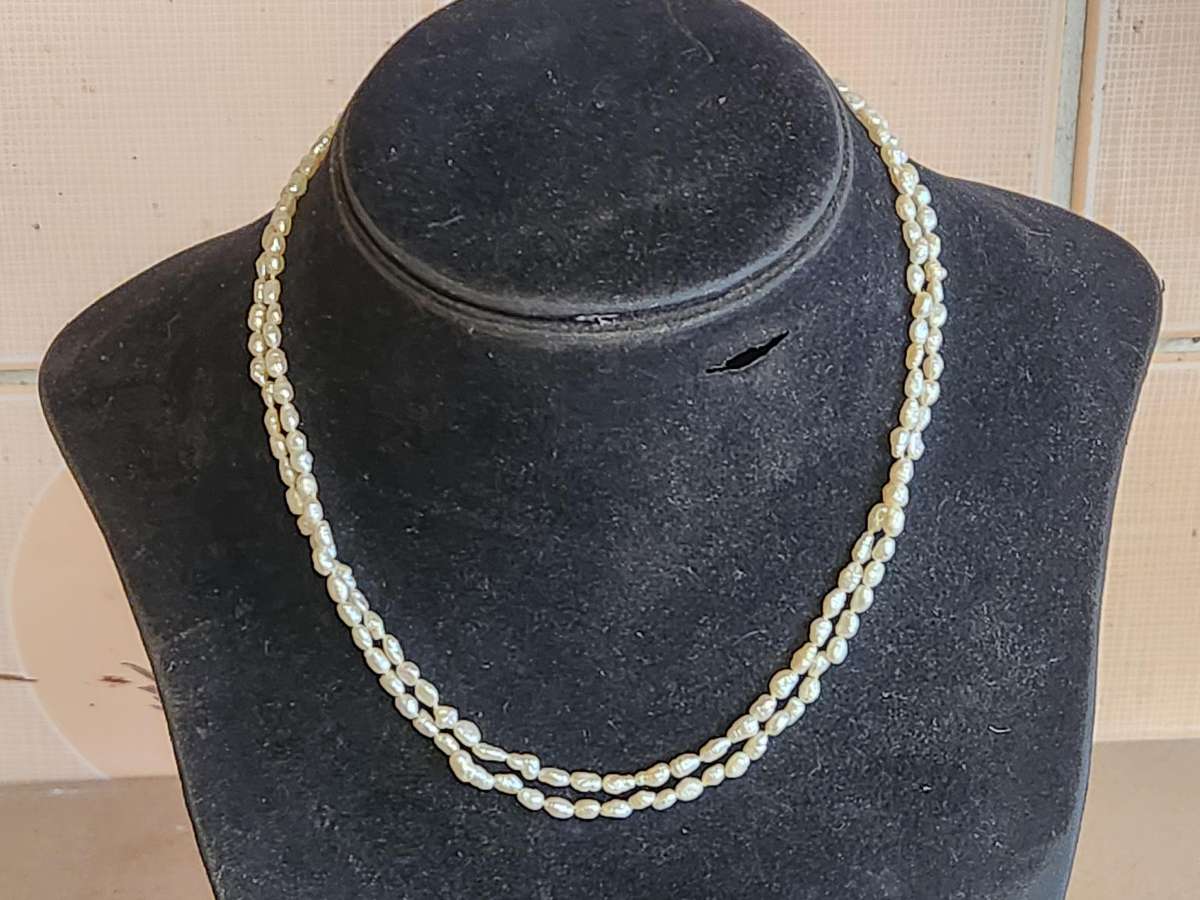 TWIN STRAND CULTURED PEARLS WITH A SILVER CLASP
