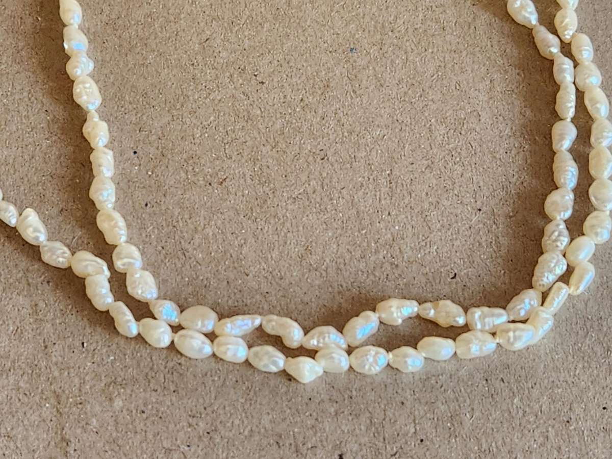 TWIN STRAND CULTURED PEARLS WITH A SILVER CLASP