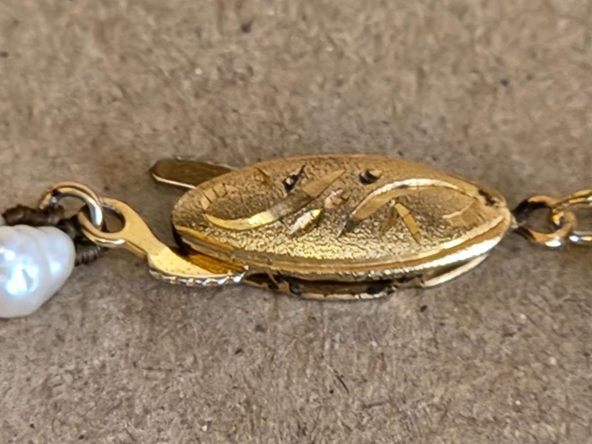 TWIN STRAND CULTURED PEARLS WITH A SILVER CLASP