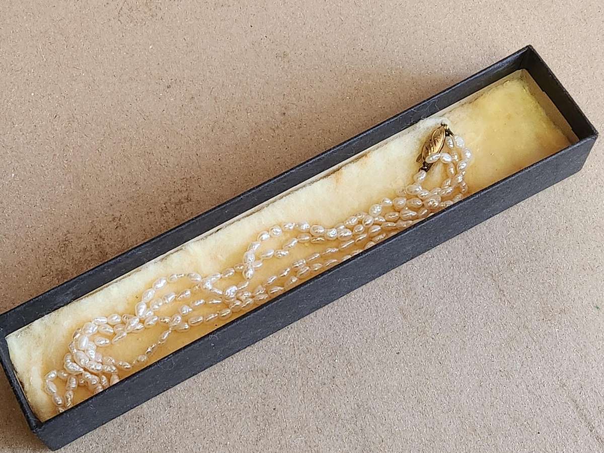 TWIN STRAND CULTURED PEARLS WITH A SILVER CLASP