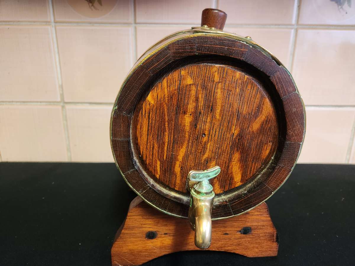 VINTAGE OAK WINE BARREL WITH BRASS HOOPS ON A CUSTOM MADE STAND