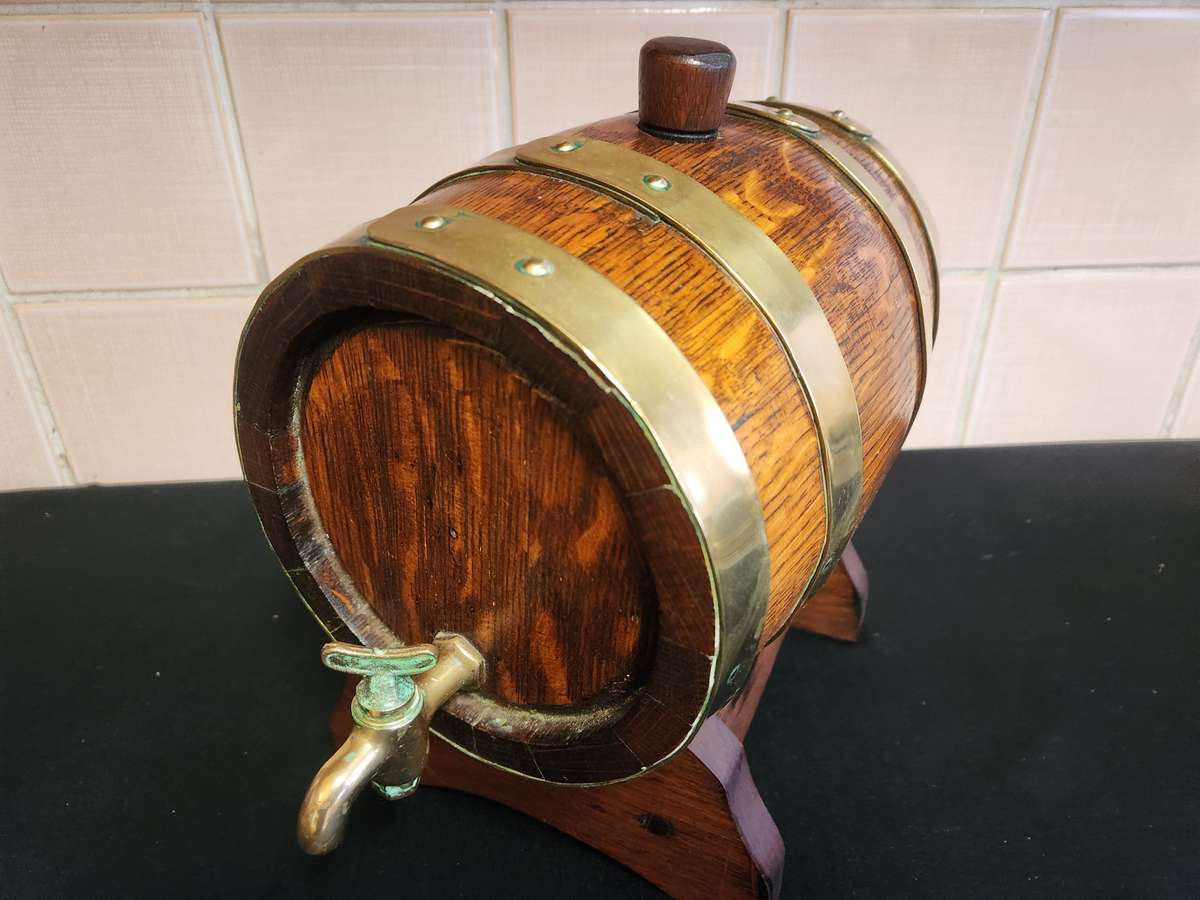 VINTAGE OAK WINE BARREL WITH BRASS HOOPS ON A CUSTOM MADE STAND