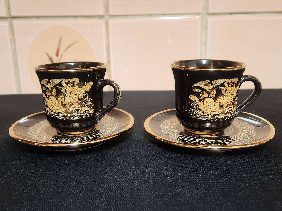 PAIR OF FOUR HANDMADE IN GREECE DEMITASSE CUPS AND SAUCERS WITH A 24 K GOLD FINISHING