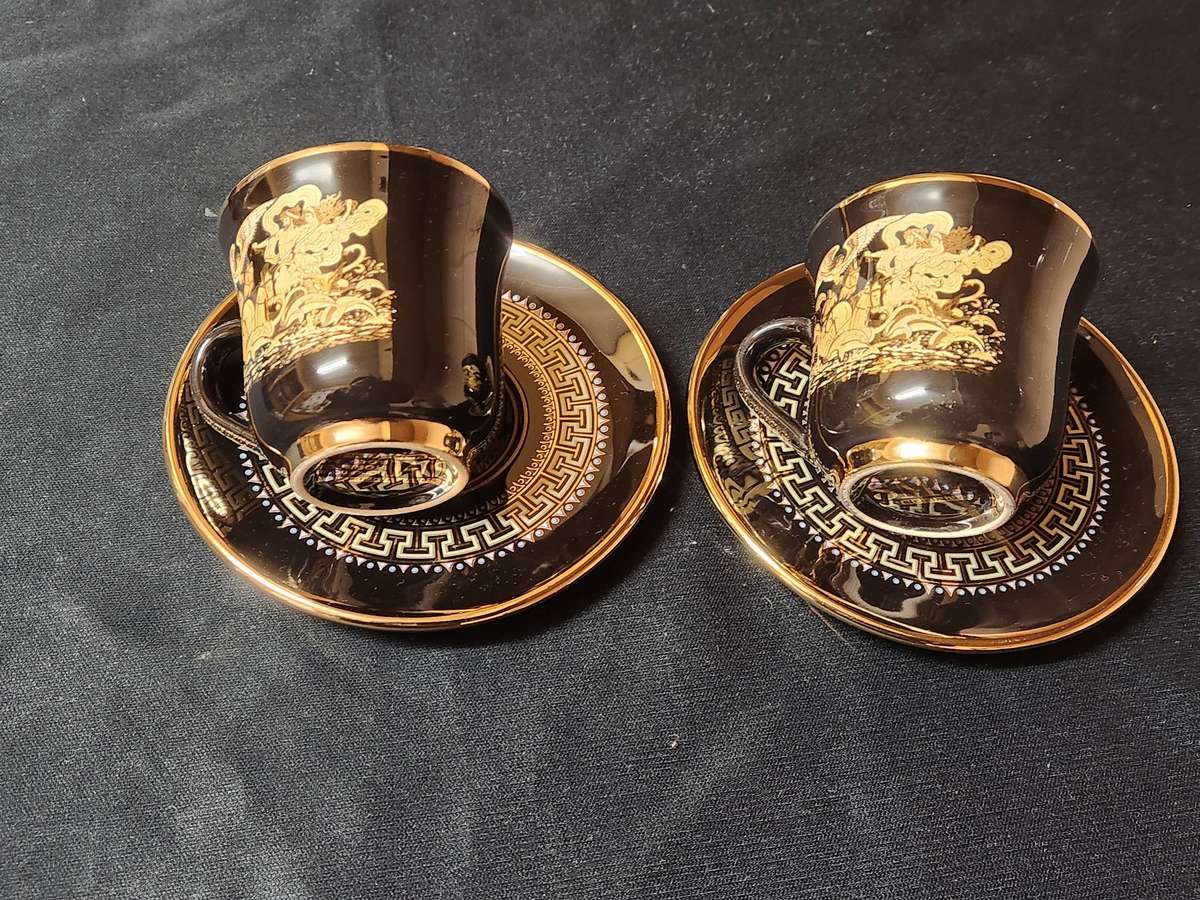PAIR OF FOUR HANDMADE IN GREECE DEMITASSE CUPS AND SAUCERS WITH A 24 K GOLD FINISHING