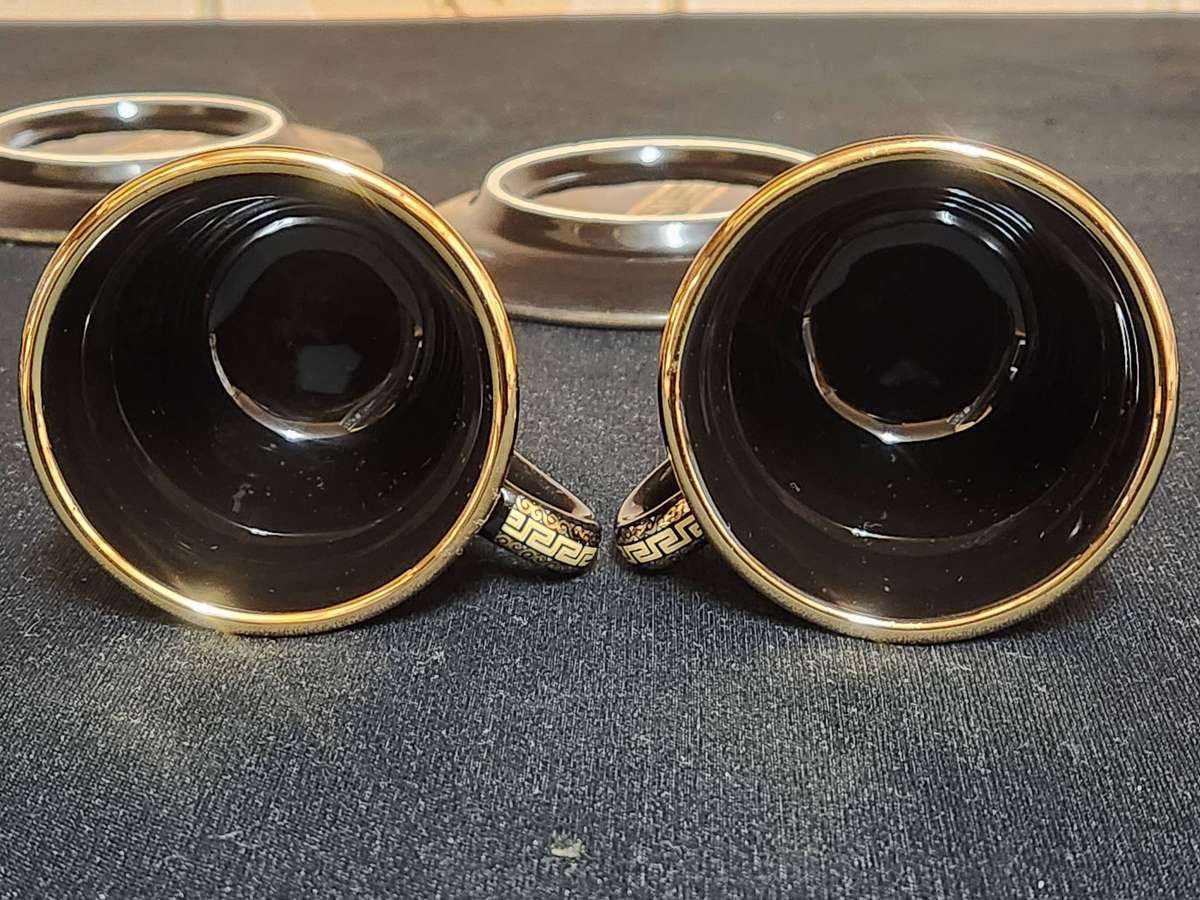 PAIR OF FOUR HANDMADE IN GREECE DEMITASSE CUPS AND SAUCERS WITH A 24 K GOLD FINISHING