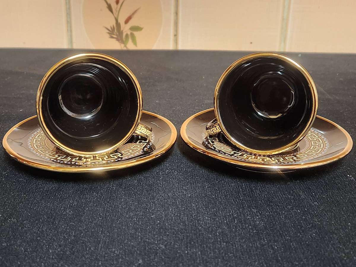 PAIR OF FOUR HANDMADE IN GREECE DEMITASSE CUPS AND SAUCERS WITH A 24 K GOLD FINISHING