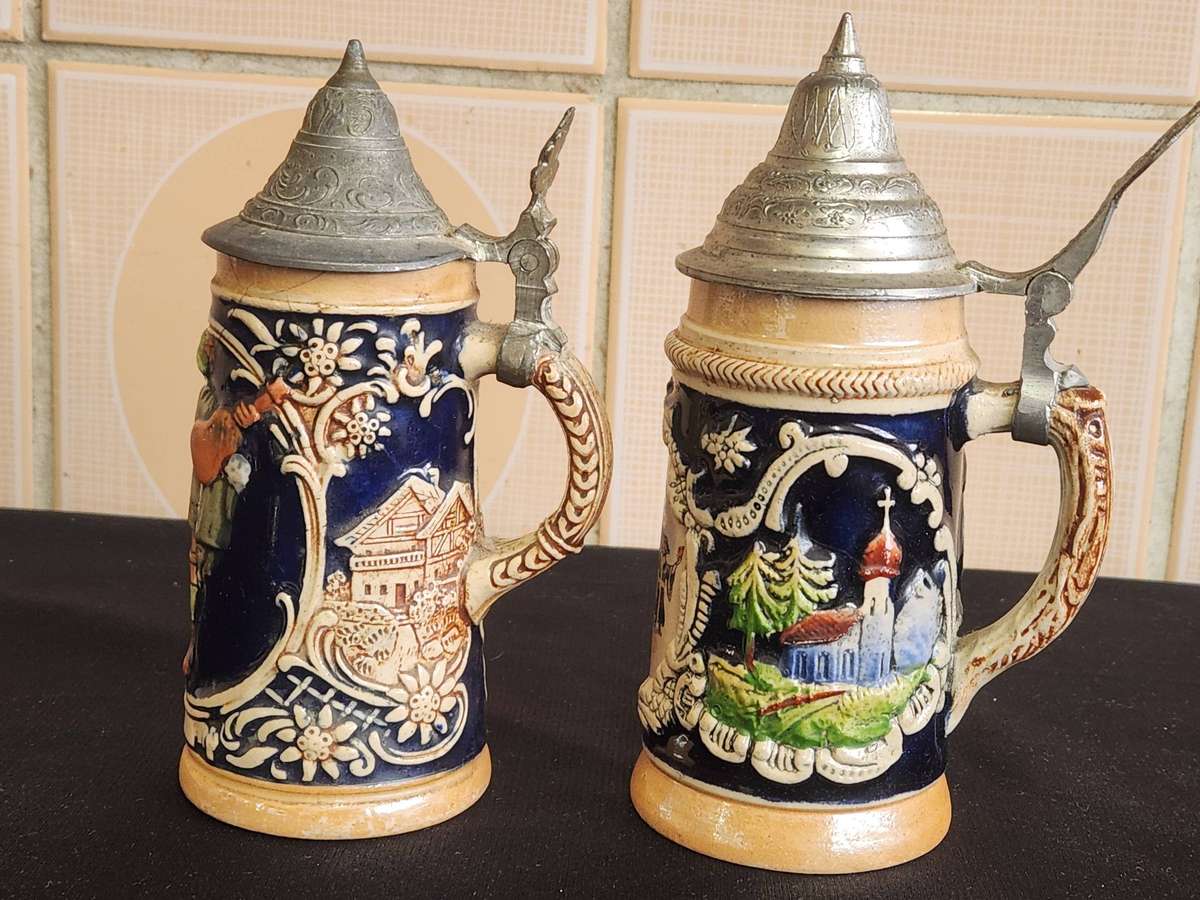 PAIR OF LIDDED GERMAN BEERSTEINS