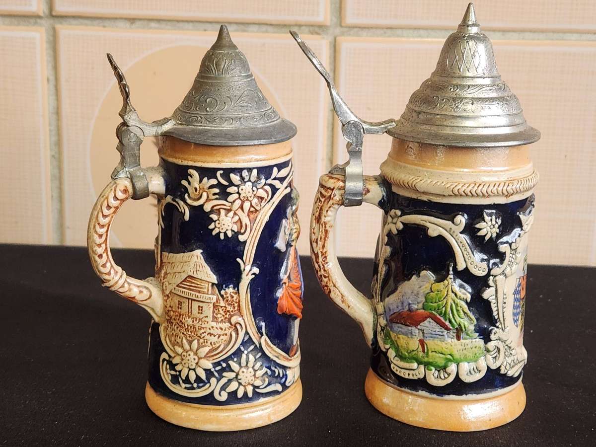 PAIR OF LIDDED GERMAN BEERSTEINS