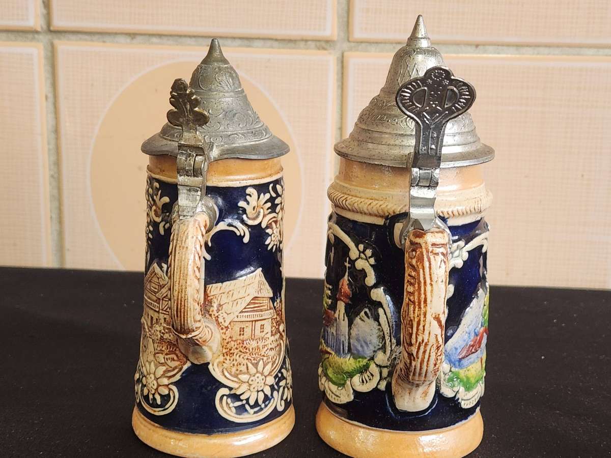 PAIR OF LIDDED GERMAN BEERSTEINS
