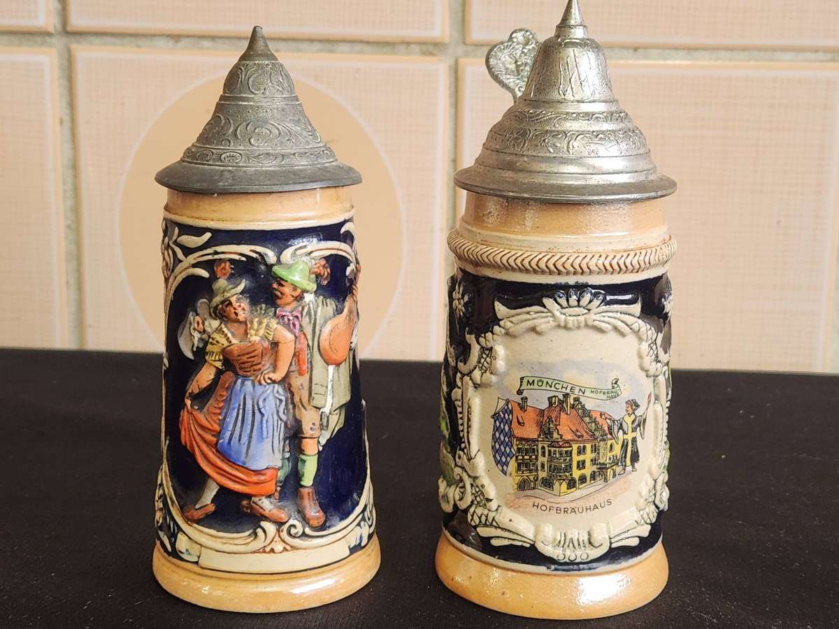 PAIR OF LIDDED GERMAN BEERSTEINS