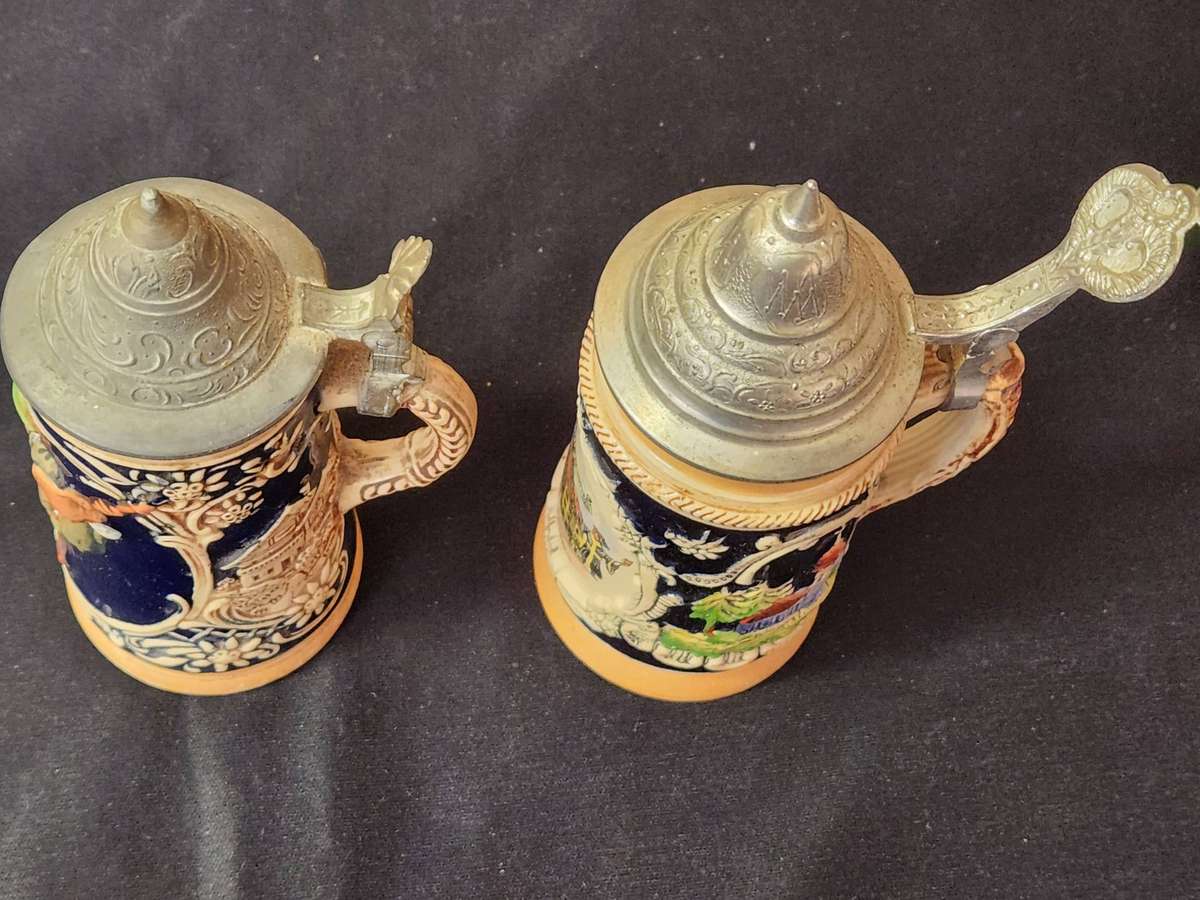 PAIR OF LIDDED GERMAN BEERSTEINS