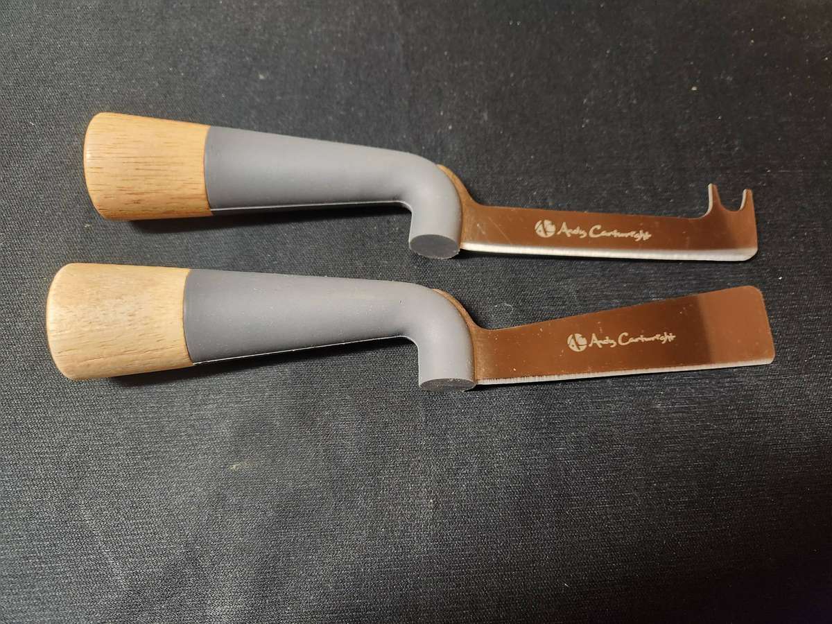 ANDY CARTWRIGHT CHEESE KNIFE SET ON A WOODEN BOARD