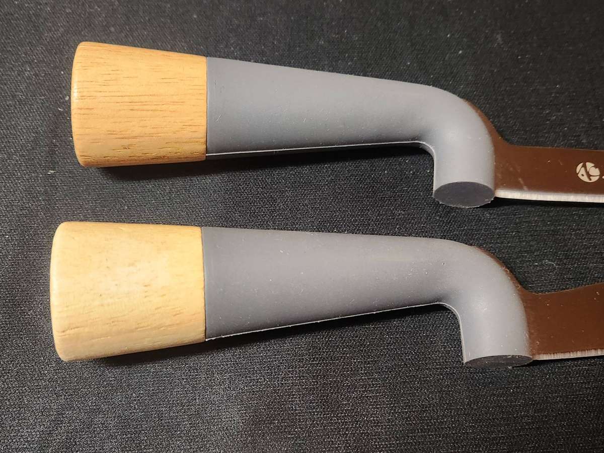 ANDY CARTWRIGHT CHEESE KNIFE SET ON A WOODEN BOARD