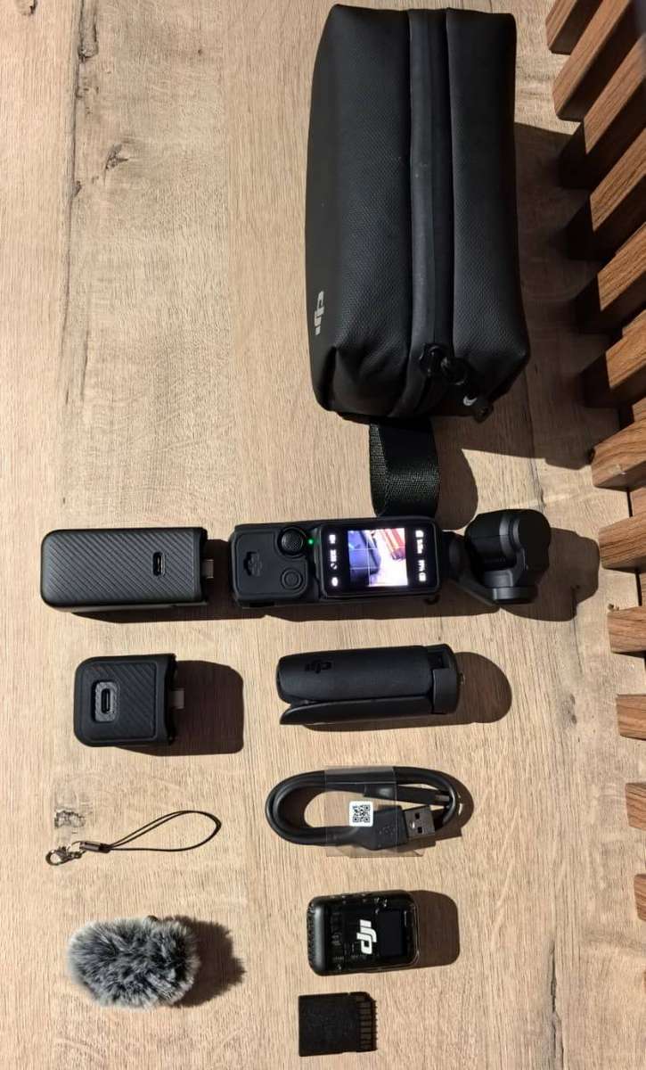 DJI Osmo Pocket 3 Creator Bundle | Wireless Mic + Battery Handle + Tripod + Carry Case | Used Mint