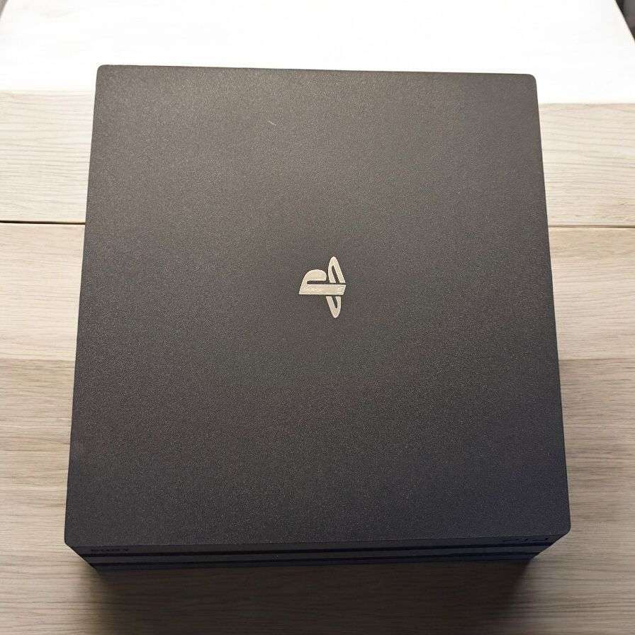 Playstation 4 Pro 1TB Console with 2 Controllers and 10 Games