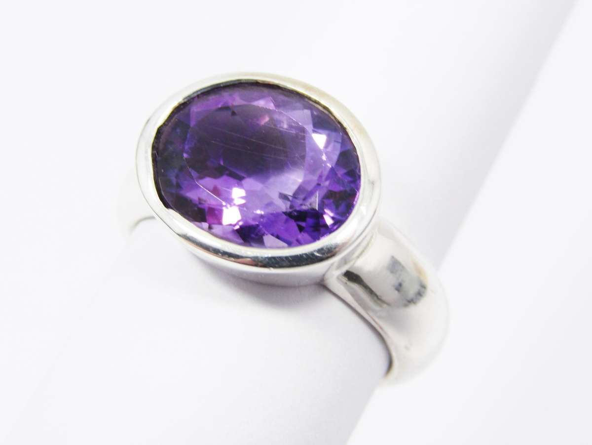 A Lovely Solid Amethyst Ring in Sterling Silver.
