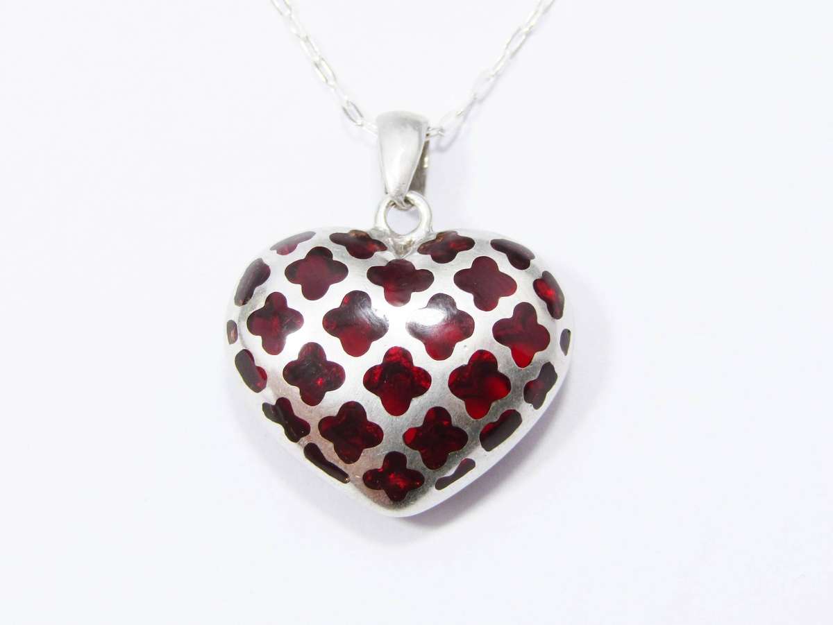 A Stunning Cherry Resin Heart Pendant on Chain in Sterling Silver.