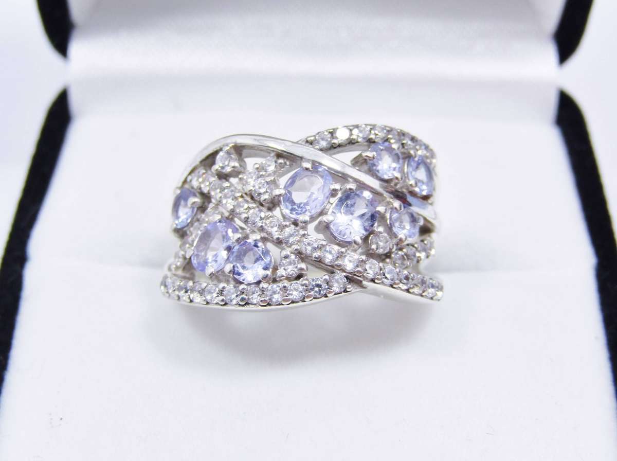 A Stunning Broad Filigree Tanzanite and Clear Zirconia Ring in Sterling Silver.
