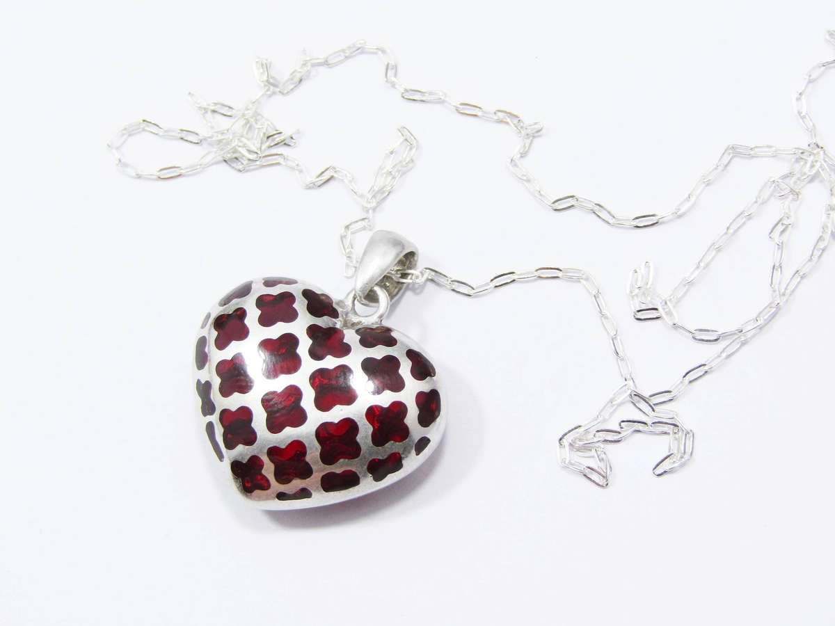 A Stunning Cherry Resin Heart Pendant on Chain in Sterling Silver.
