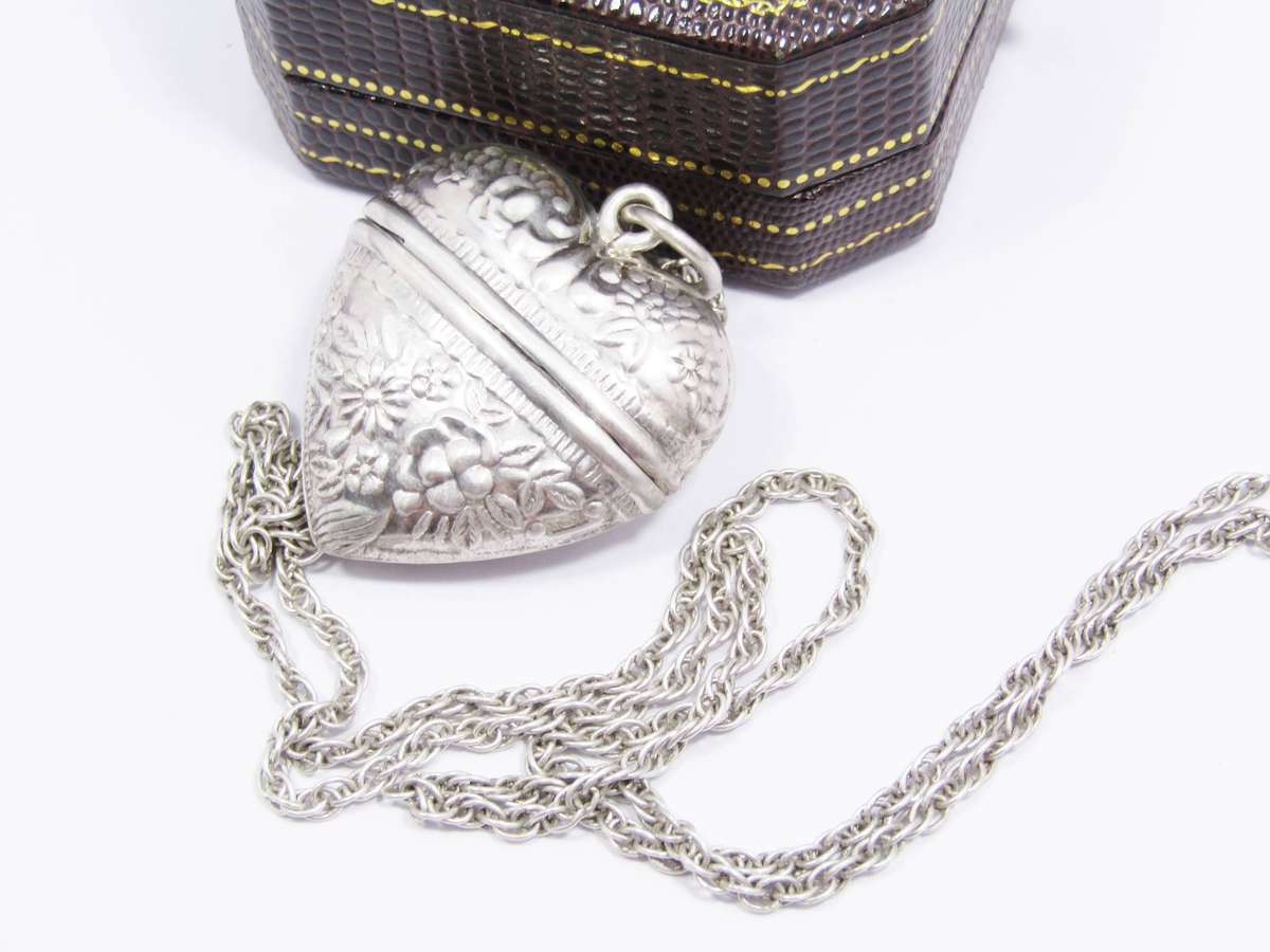 A Gorgeous Repoussé Large Keepsake Locket on Chain in Sterling Silver.